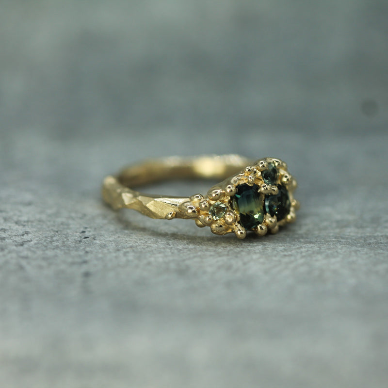 textured side view of the cluster sapphire ring 