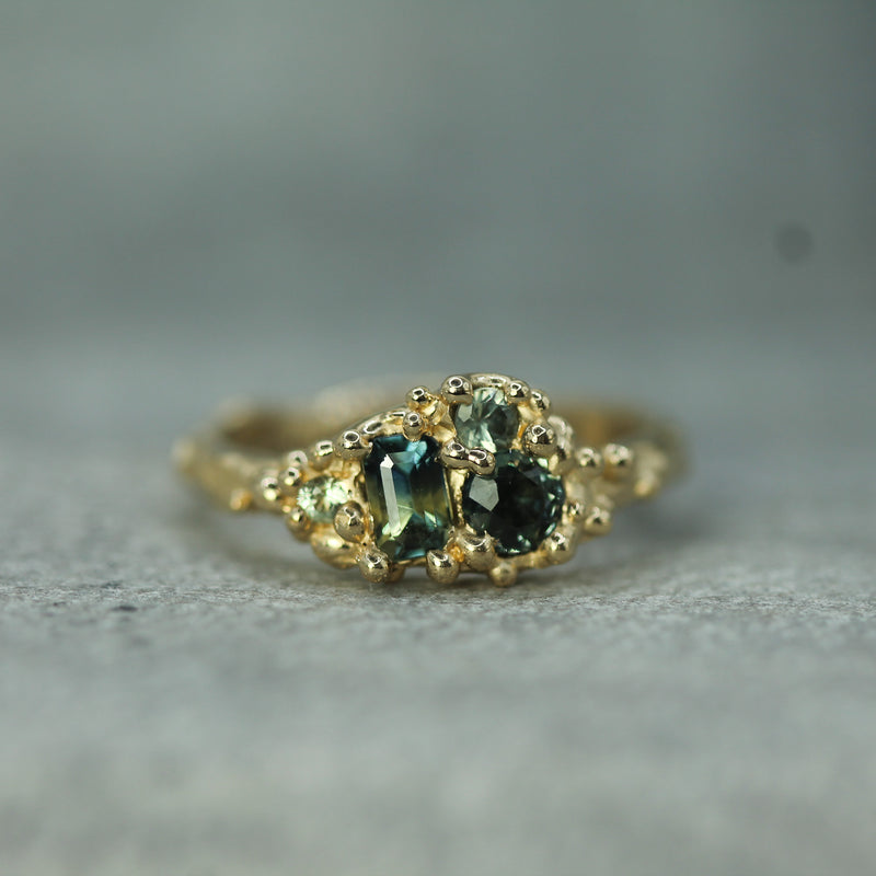 mermaid cluster ring with green and blue sapphires in 14k yellow gold 
