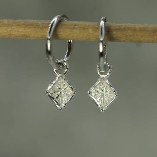 triangular shaped silver sleeper charms on click shut hoops 