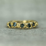 blue sapphire mermaid treasure band in 14k yellow gold 