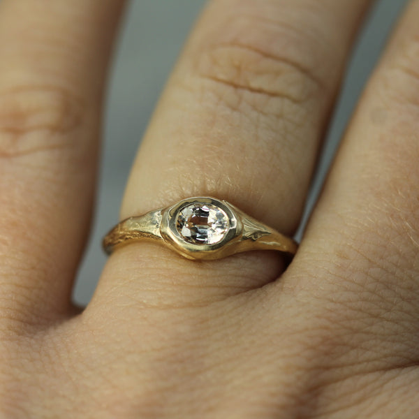 sapphire signet ring on hand 