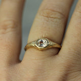 signet sapphire ring on hand 