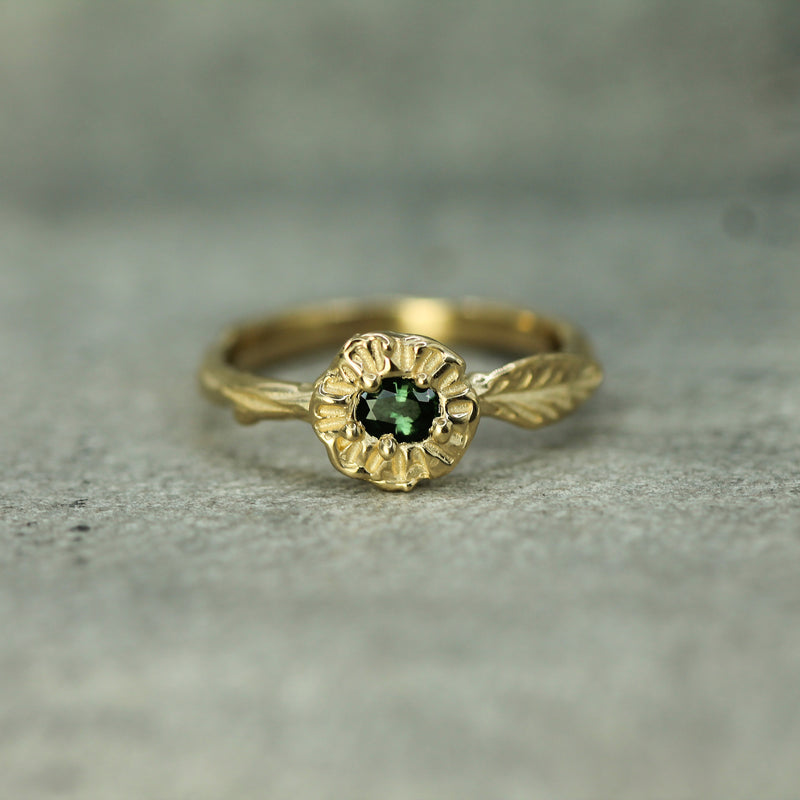 green sapphire leaf ring in 14k yellow gold 
