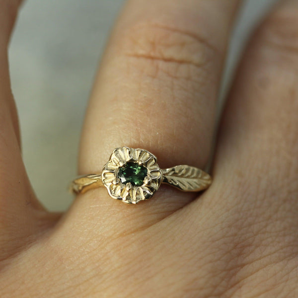 hand carved leaf gold ring on hand 
