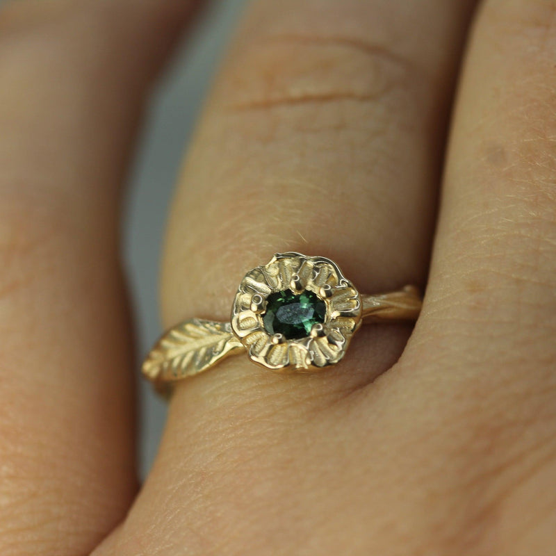 14k yellow gold leaf ring with green sapphire 