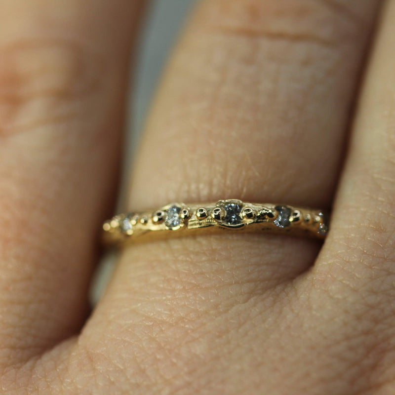 diamond gold band on hand 