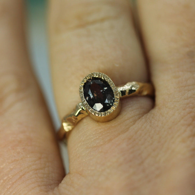 oval purple sapphire gold ring 