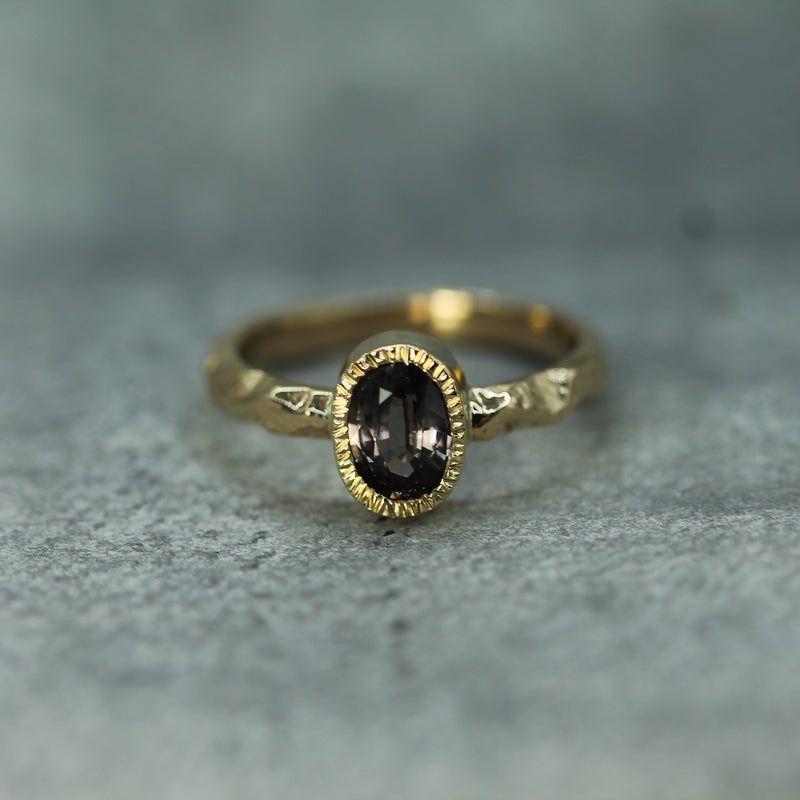oval purple sapphire gold ring 