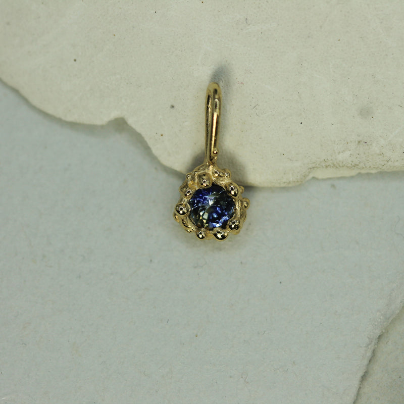 gold mermaid treasure pendant with blue sapphire 