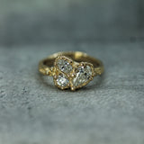 three lab-grown diamonds set in 14k yellow gold 
