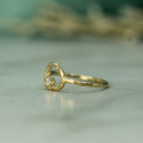 gold ring shown side on to show the detail of the band 