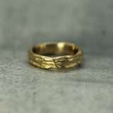 gulf current textured band in 14k yellow gold 

