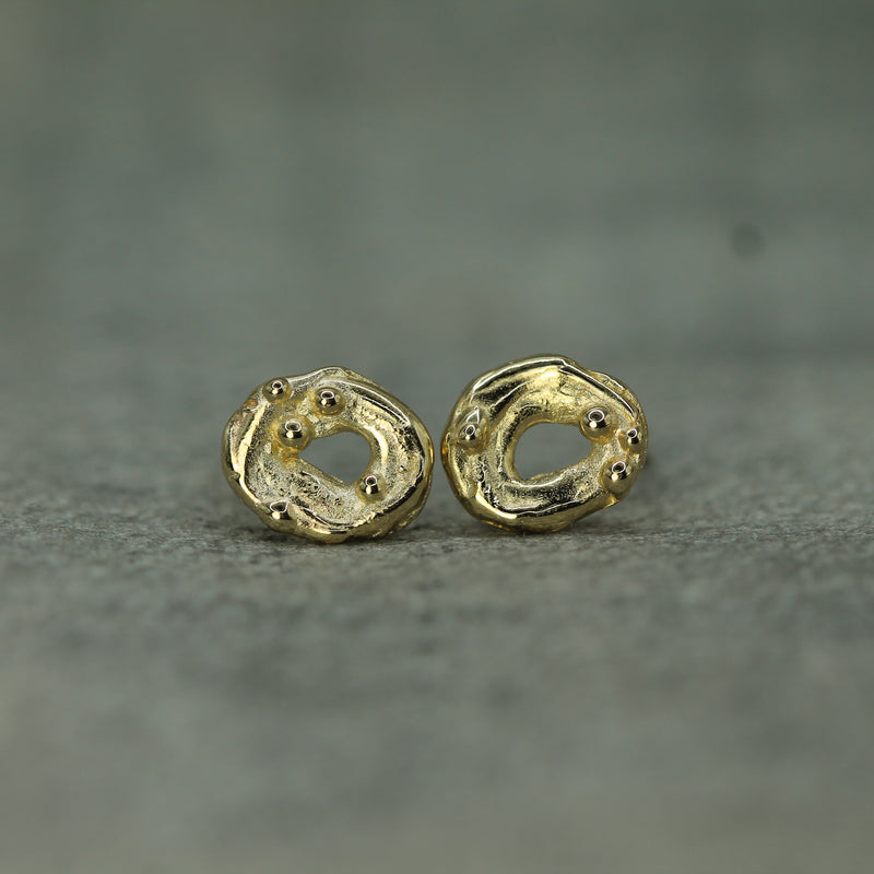 handcarved moonswirl gold earrings 