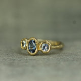 trio of sapphire set in solid 14k yellow gold 