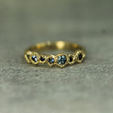 shades of blue sapphires set in yellow gold 