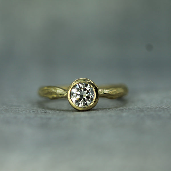 diamond calm waters ring in 18k yellow gold 
