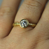 diamond engagement ring on hand 