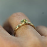 14k yellow gold sapphire ring on hand 