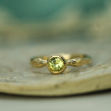 yellow sapphire set in 14k yellow gold 