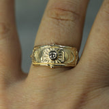 diamond yellow gold moon phase ring on hand 