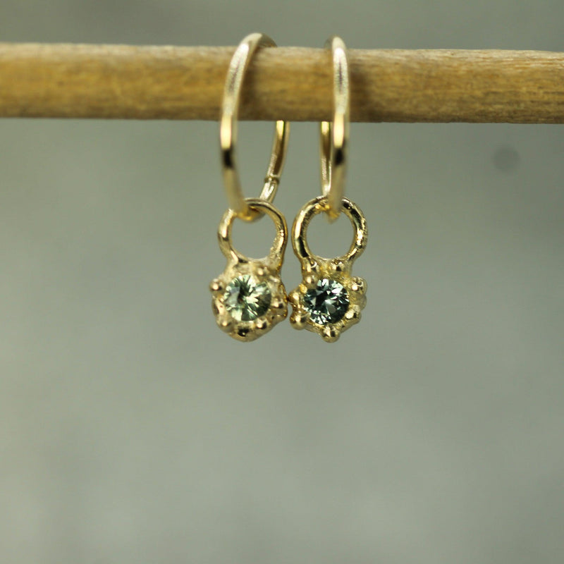 sage green sapphire sleeper charms in 10k yellow gold 