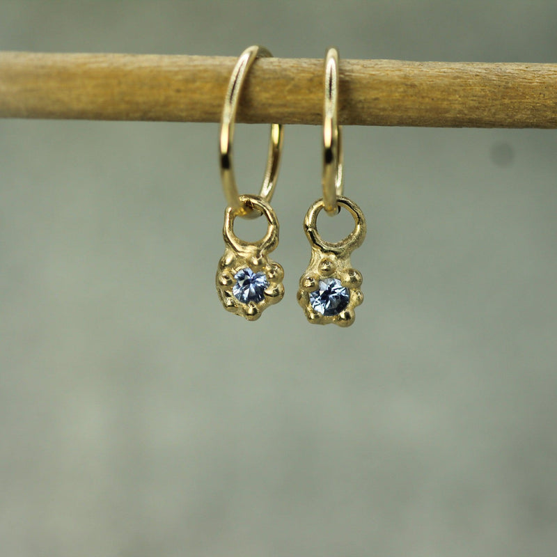 10k yellow gold sleeper charms with blue sapphires 