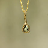 yellow gold teal sapphire pendant on chain 
