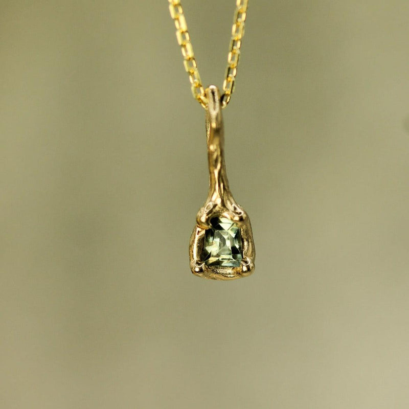 yellow gold teal sapphire pendant on chain 