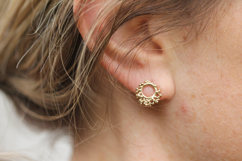 Russell Reef Studs on ear to show the scale of the design 